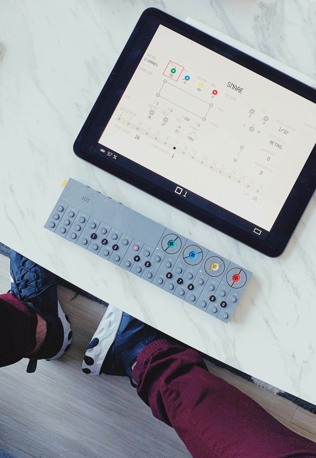 Close-up of a person adjusting settings on a tablet dashboard